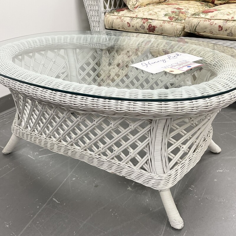 Vintage Oval  wicker Henry Link Coffee Table with glass top.  Part of the Smithsonian collection.