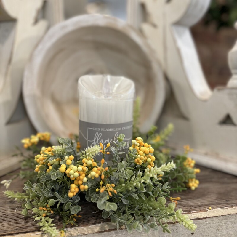 The Yellow Harpeth Candle Ring is a pretty candle ring with shades of yellow berries and shades of greenery. Ring measures 10 inches in diamere and has a inner ring of  3 inches