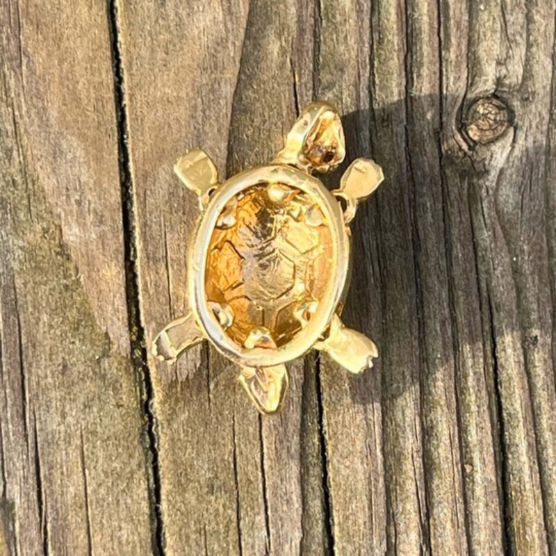 14K Tri Color Gold Turtle Pendant
Featuring White, Yellow, and Rose Golds
Two Real Ruby Eyes
Moveable Limbs, Head, and Tail- This LittleTurtle Really Swims!
Measures Around 1 inch Head to Tail