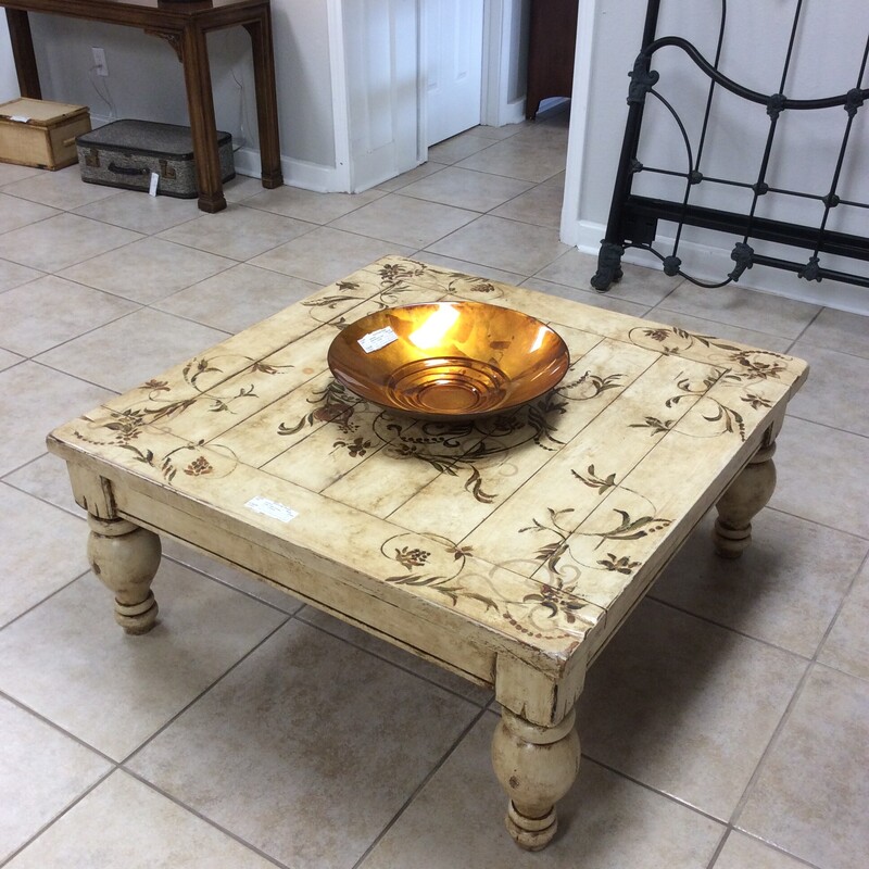 This is a beautiful painted coffee table! Painted and distressed for that timeless, weathered look. It features painted scrollwork, leaves and florals.