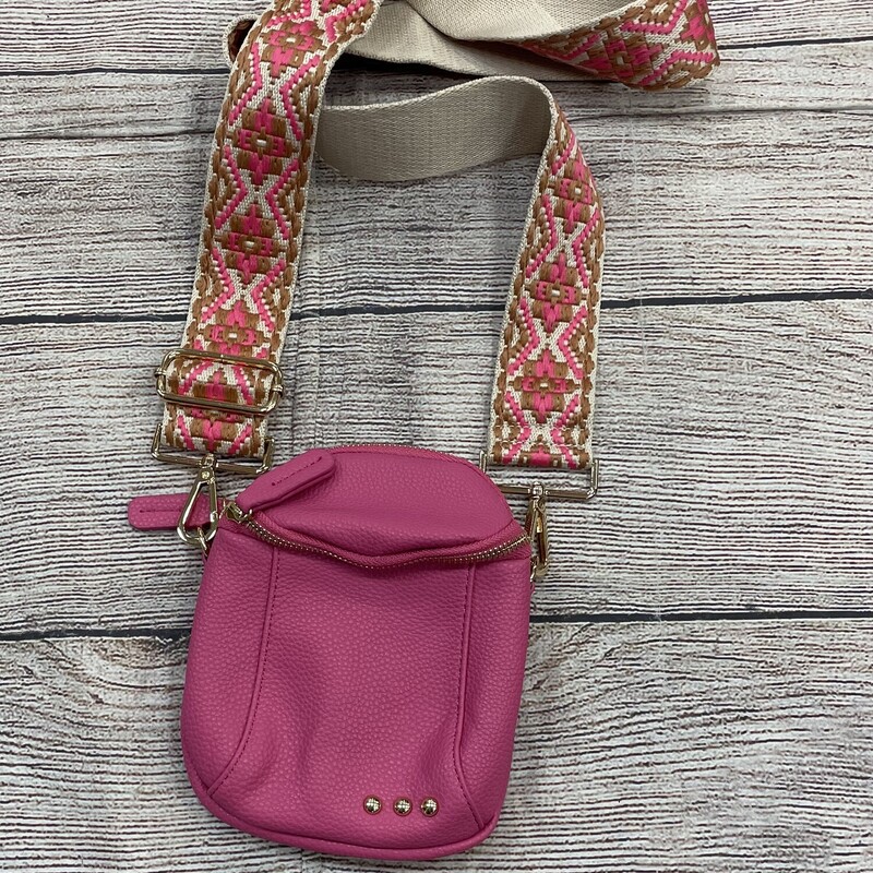 Fushia cross body purse has a wide adjustable strip with cool embroidery 2 zip pockets
