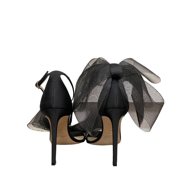Black Jimmy Choo Bow  Heels

Jimmy Choo Aveline fabric sandals with tulle bow accent
4.00 in / 100 mm stiletto heel
Open toe
Adjustable ankle strap
Leather outsole
Made in Italy