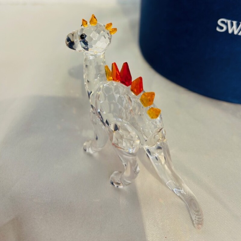 Swarovski Crystal Dinosaur
Clear Orange Red Size: 3 x 2.5H
As Is - one spike on top of his head is missing
Original box included
