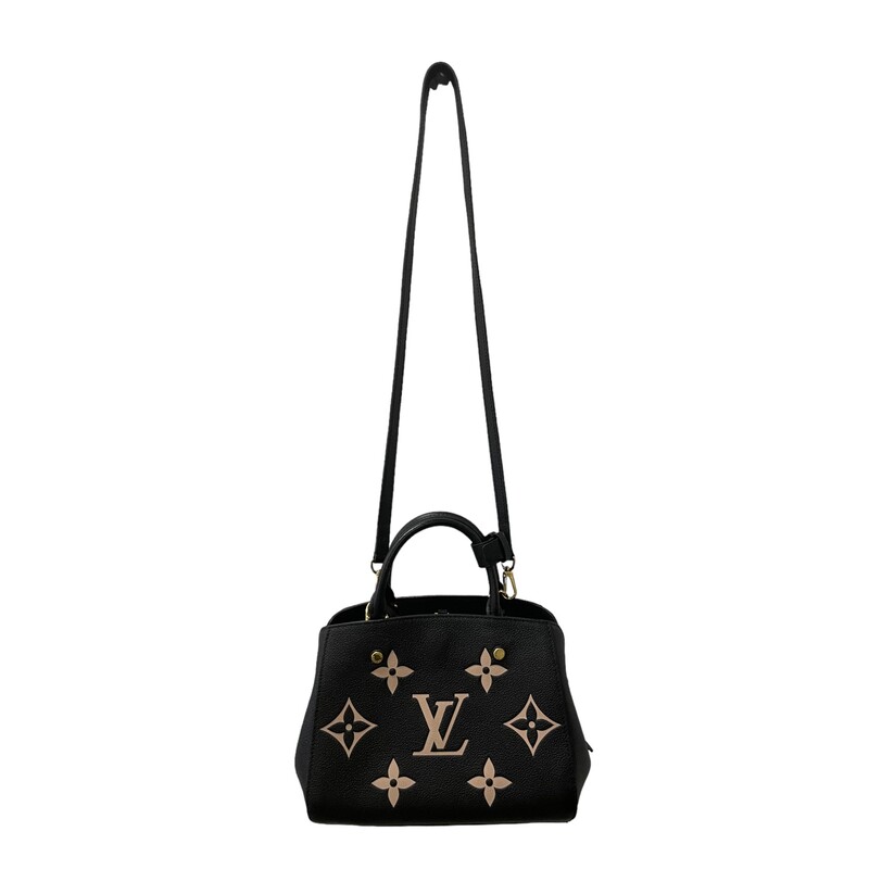 LOUIS VUITTON Empreinte Monogram Giant Montaigne BB in Black and Beige. This popular crossbody handbag is featured in rich calfskin, embossed with a giant Louis Vuitton monogram in beige on black leather. The shoulder bag features a leather top handle, and an optional adjustable leather shoulder strap. This opens to a partitioned microfiber interior with patch pockets.<br />
<br />
Size<br />
<br />
Base length: 9.5 in<br />
<br />
Height: 7.75 in<br />
<br />
Width: 4 in<br />
<br />
Drop: 3.5 in<br />
<br />
Drop: 22 in