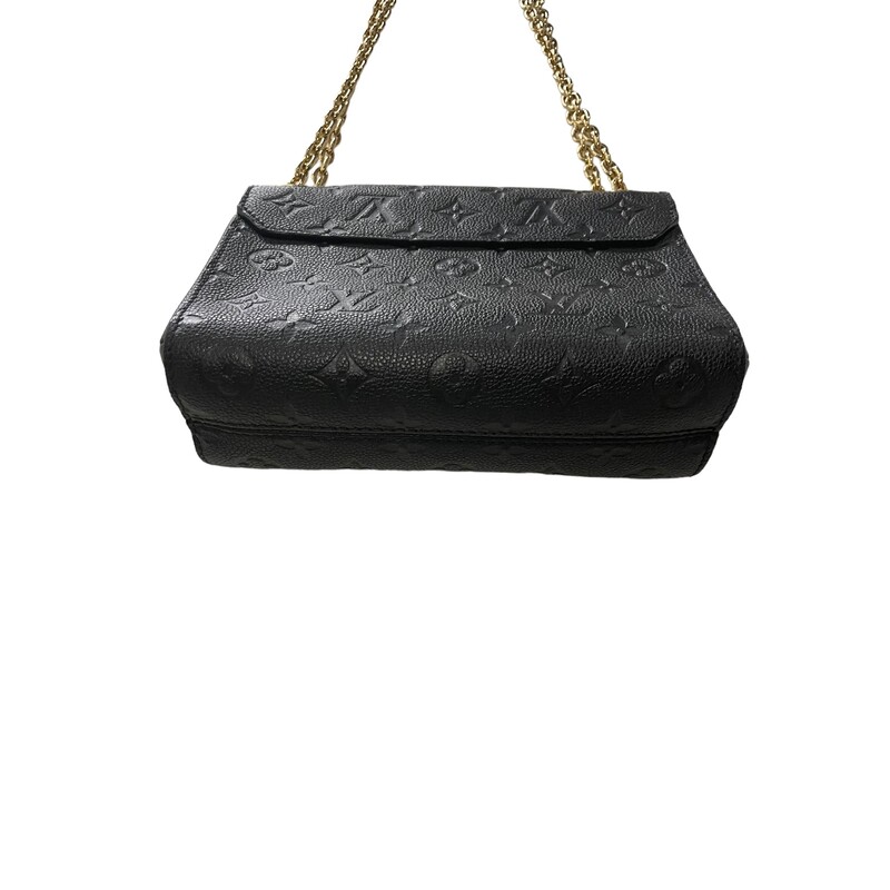 Louis Vuitton Vavin, Black, Size: BB
The new Vavin BB brings a contemporary twist to a classic bag. Its sophisticated mix of smooth and embossed Monogram Empreinte leather contrasts with the gold finish of the comfortable chain strap and the clasp modeled after Louis Vuitton’s historic trunk locks. Compact yet large enough to hold all the essentials, it makes a superb day-to-evening companion.
8.1 x 5.9 x 3.1 inches
(length x Height x Width)
Black
Embossed supple grained cowhide leather and supple grained cowhide leather
Supple grained cowhide leather trim
Microfiber lining
Gold-color hardware
Metal signature lock