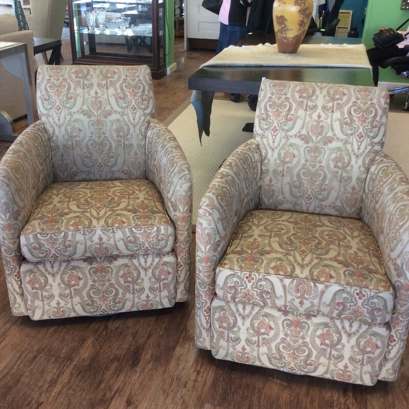 This pair of swivel Occasional Chairs have a clean simple design.