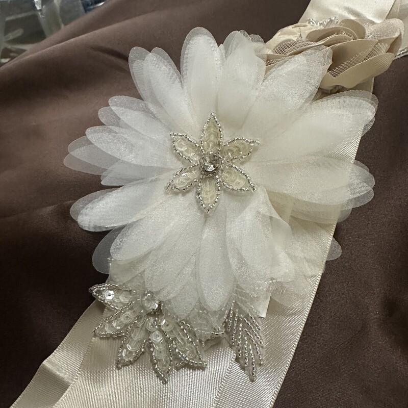 NEW Floral Satin Belt, Champagne With Mixed Media Fabric Flowers<br />
New Price $69.00<br />
Our Price $37.99<br />
Shipping Is Available<br />
or<br />
Pick Up In Store Within 7 Days Of Purchase<br />
All Sales Are Final . No Returns