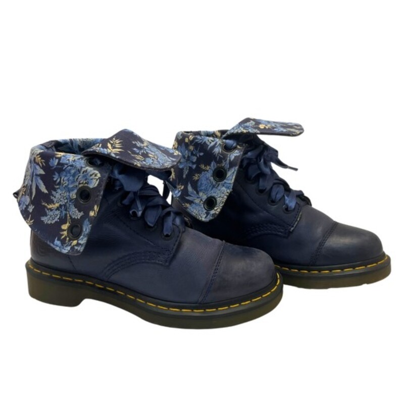 Dr Martens Aimilie Leather Combat Boot<br />
<br />
Foldover Lace Up 9-eyelet boot<br />
(similar to triumph with shorter shaft)<br />
Can be worn up or folded down to ankle height<br />
Navy Leather with floral canvas lining<br />
Satin ribbon laces<br />
Size: 38   7 -7.5