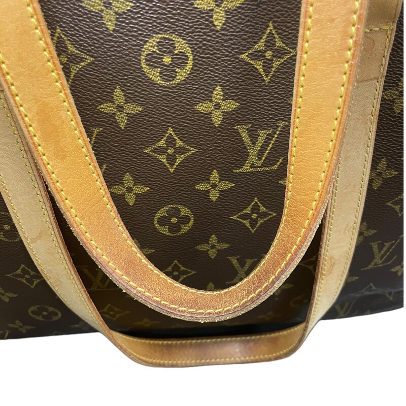 Louis Vuitton Loco Tote
Monogram toile canvas. The bag features tall vachetta leather strap handles with brass links. The top zipper opens to a spacious beige microfiber interior with zipper and patch pockets.
Dimensions: W:15.9 x H:11.8 x D:4.1
Drop: 10 in