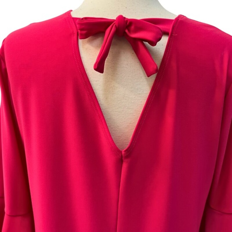 NEW Clara Sun WooTulip Cuff Back Tie Dress<br />
Color: Hot Pink<br />
Size: Medium (12)<br />
Wrinkle Free<br />
Travel Friendly<br />
Ultra Lightweight Soft Knit Fabric<br />
Breathable Jersey-Like Feel<br />
<br />
Retails: $139