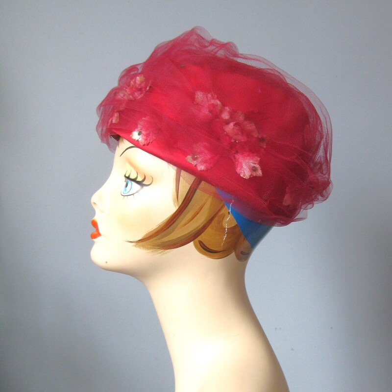 Vtg Mesh Flower, Burgundy, Size: None<br />
Dreamy pillbox hat from the 50s<br />
This hat is a structured pill box generously covered with with same color netting.  Peeking from out from the netting are pale color fabric flowers.<br />
<br />
The main color is deep deep pink almost burgundy red.<br />
Union label<br />
Interior circumference: 21 7/8<br />
My  mannequin has a smaller than average head so this hat may sit higher or further back on the crown of your head.<br />
thanks for looking!<br />
<br />
#63062