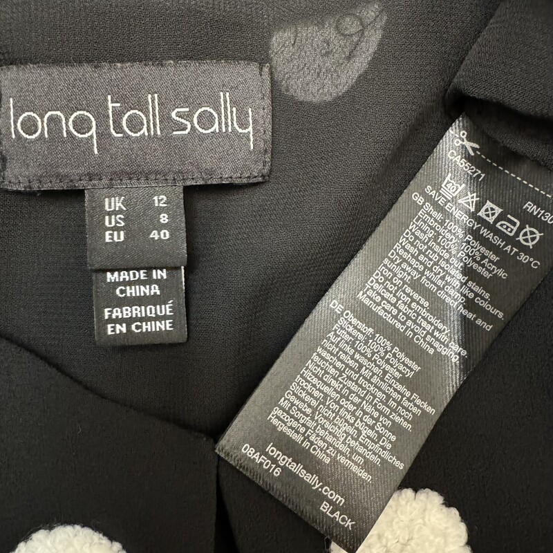 Long Tall Sally Blouse<br />
Amazing Textured Polka-Dot Pattern<br />
Balloon Sleeve<br />
Black and White<br />
Size: Medium