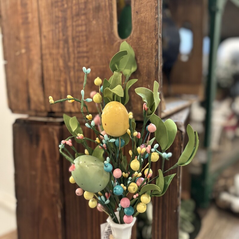 Egg and herb stem features pastel colored eggs, seeds and berries for a bright themed easter finish.  Bush has fabric leaves and paper wrapped branch.
Stem measures 15 inches high