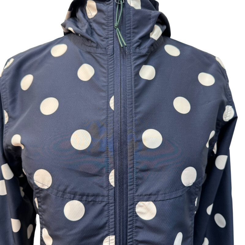 New Herschel Windbreaker<br />
Water and Wind Resistant<br />
Cute Polka-Dot Pattern<br />
Navy and White<br />
Size: XS