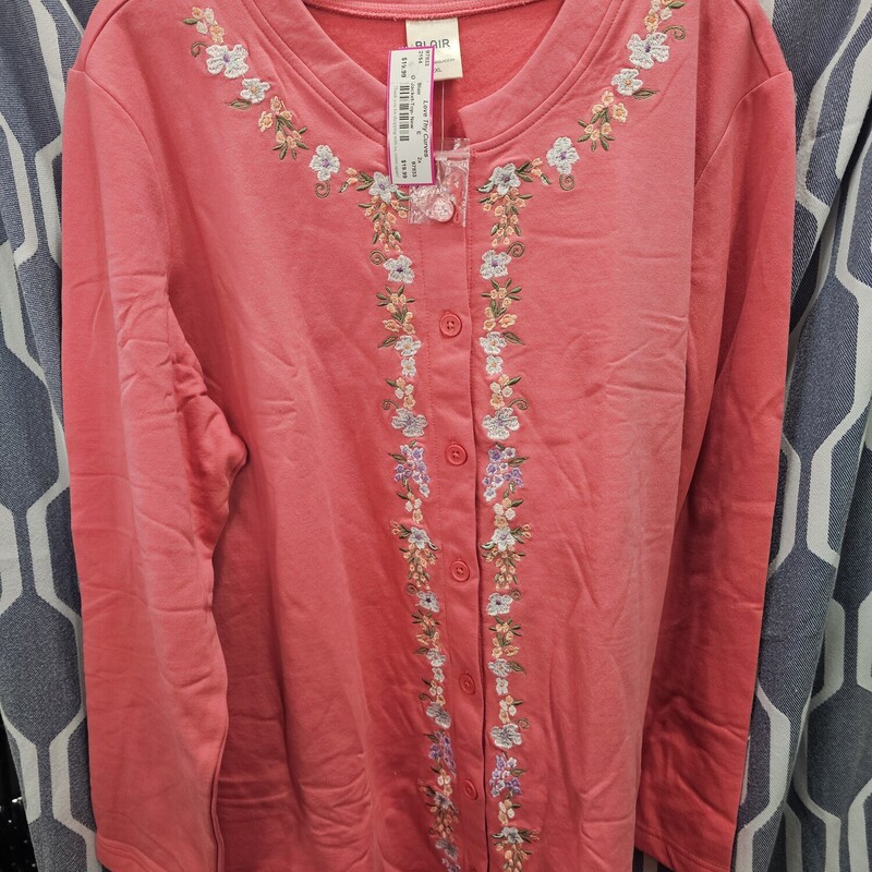 Brand new without tags, this button up front fleece cardigan style jacket topper is salmon pink in color with floral design embroidered up the front and along the neckline. Beautiful!