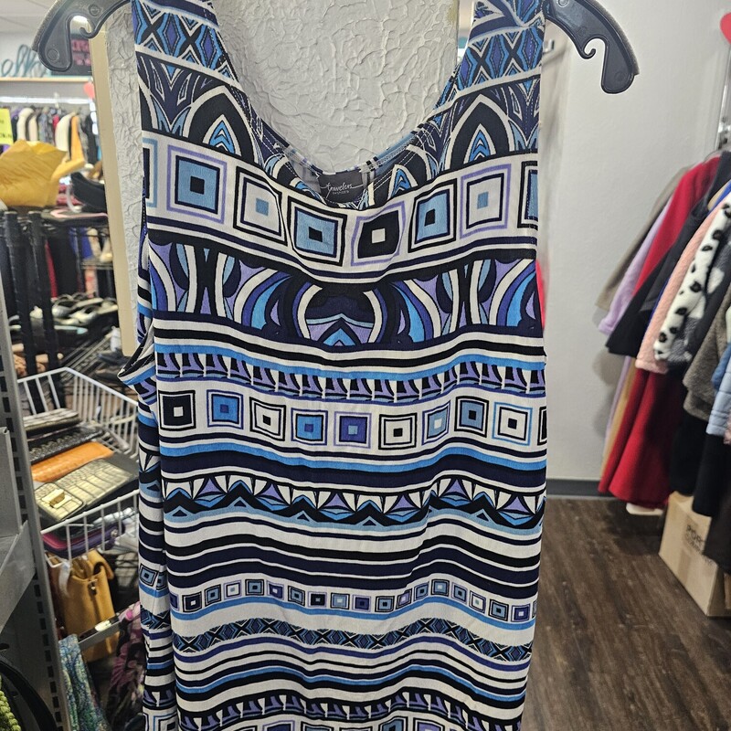 Cute tank in white, blue and navy print made of acetate and spandex. Crew cut neck line.