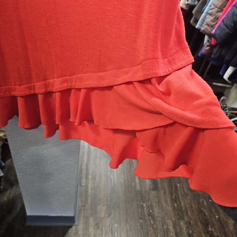 Long sleeve super lightweight knit top in with adorable and flattering ruffle edges along the hem line. Soooo cute!