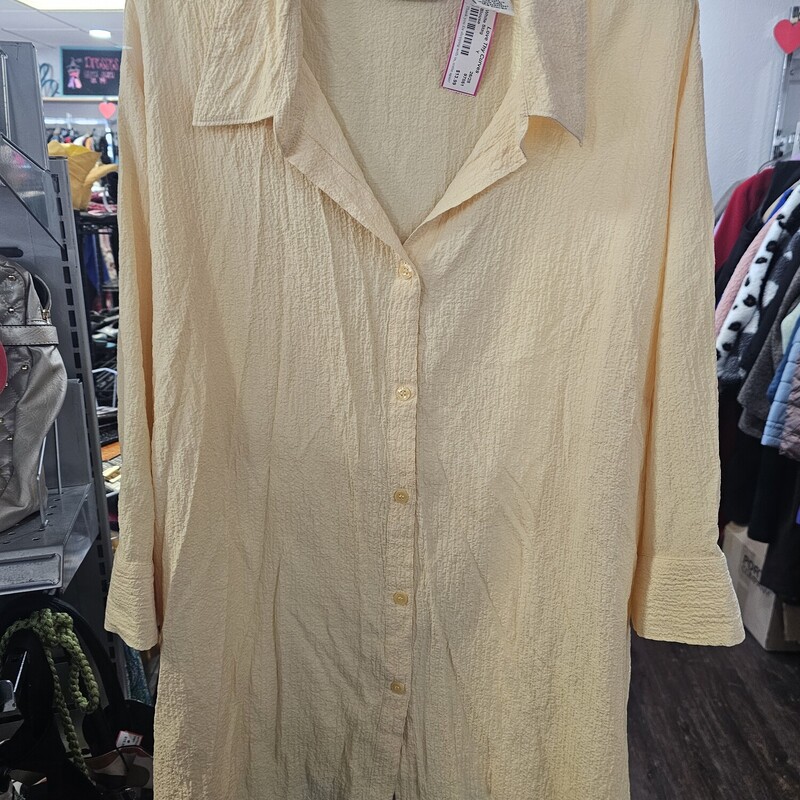 Super light weight half sleeve button up blouse in a canary yellow,