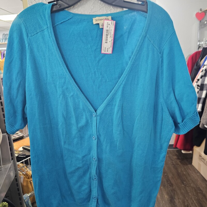 Short sleeve blue cardigan with button front.