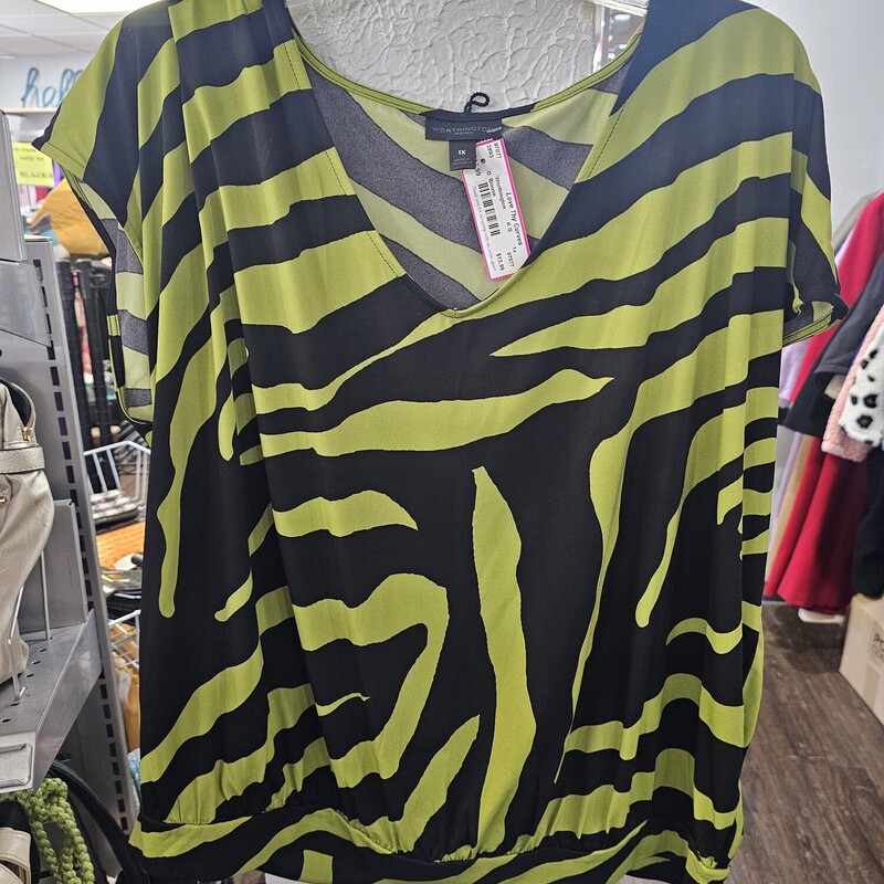 Cap sleeved blouse in a fun green and black striped print with a banded waist hem and a v neck cut.