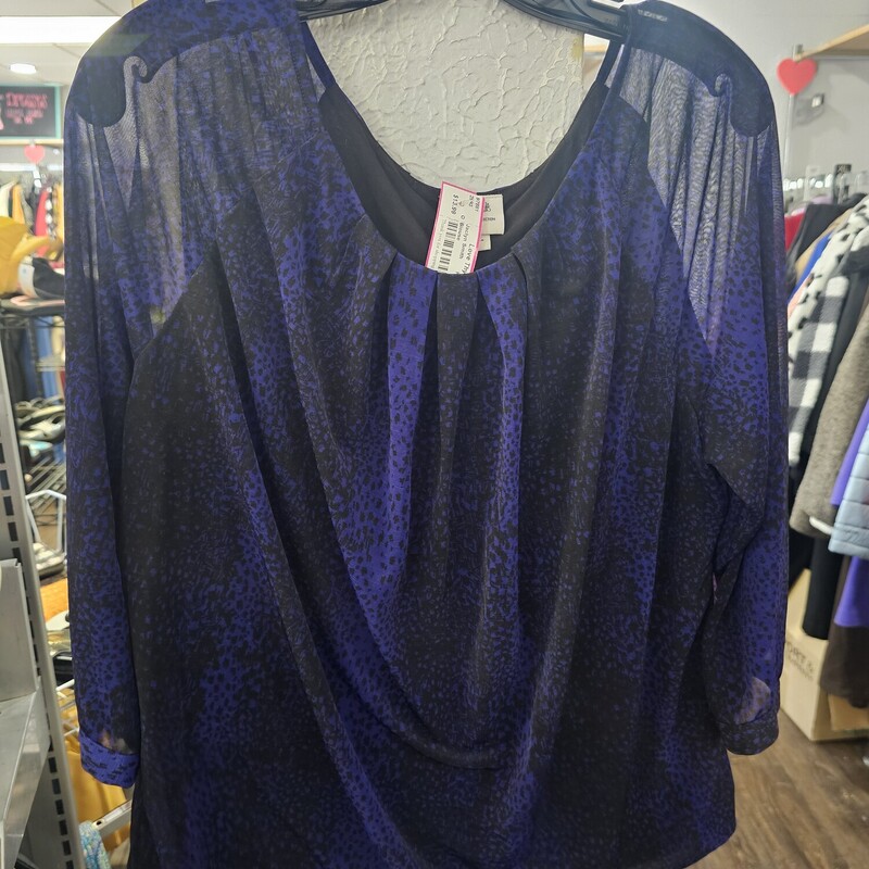 Half sleeve blouse in a beautiful black and deep blue (almost purple) print. Simply gorgeous.