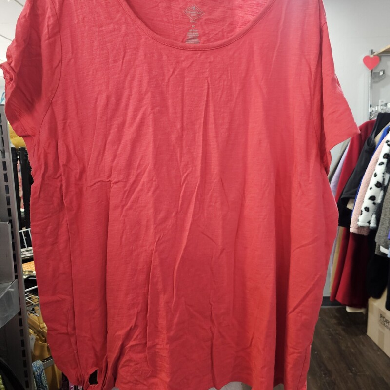 Short sleeve tee with crew cut neckline in a salmon pink color.