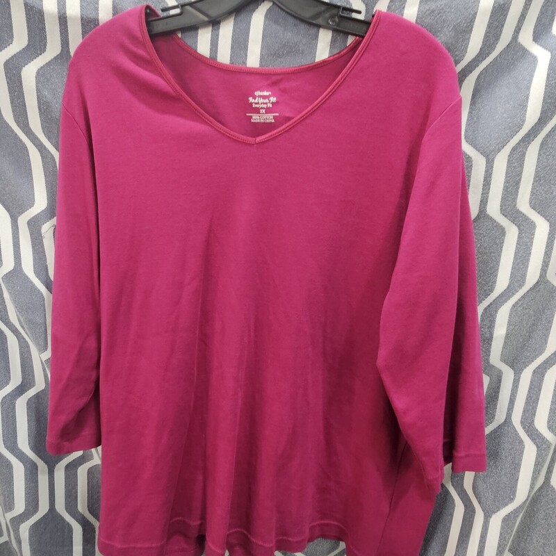 Half sleeve knit top with crew cut neckline in a burgandy pink