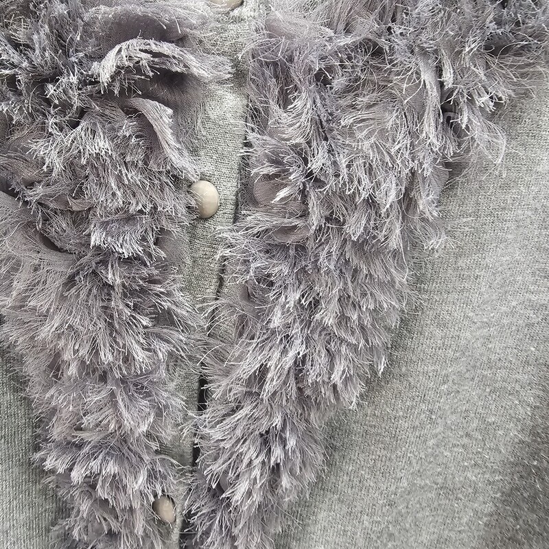 Super cute grey cardigan, lightweight and adorned with freyed tulle along the neckline for added cuteness.