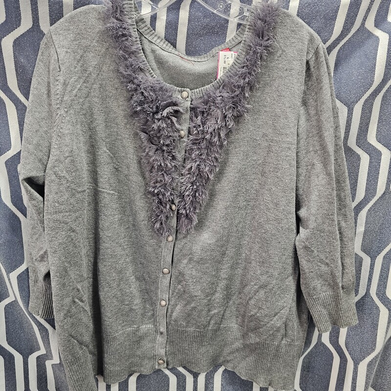 Super cute grey cardigan, lightweight and adorned with freyed tulle along the neckline for added cuteness.