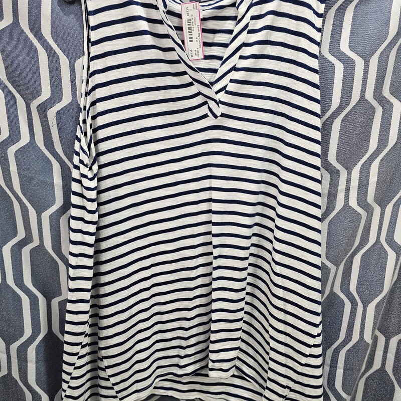 Sleeveless knit top with white and navy striping. Flair on the bottom gives a flattering fit to any body type.