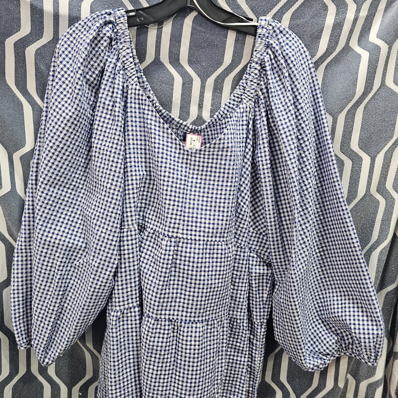 Super cute blue and white checked pattern blouse with baby doll fit and flowy long sleeves with elastic cuff. Pair with  a denim short and your cutest sandals.