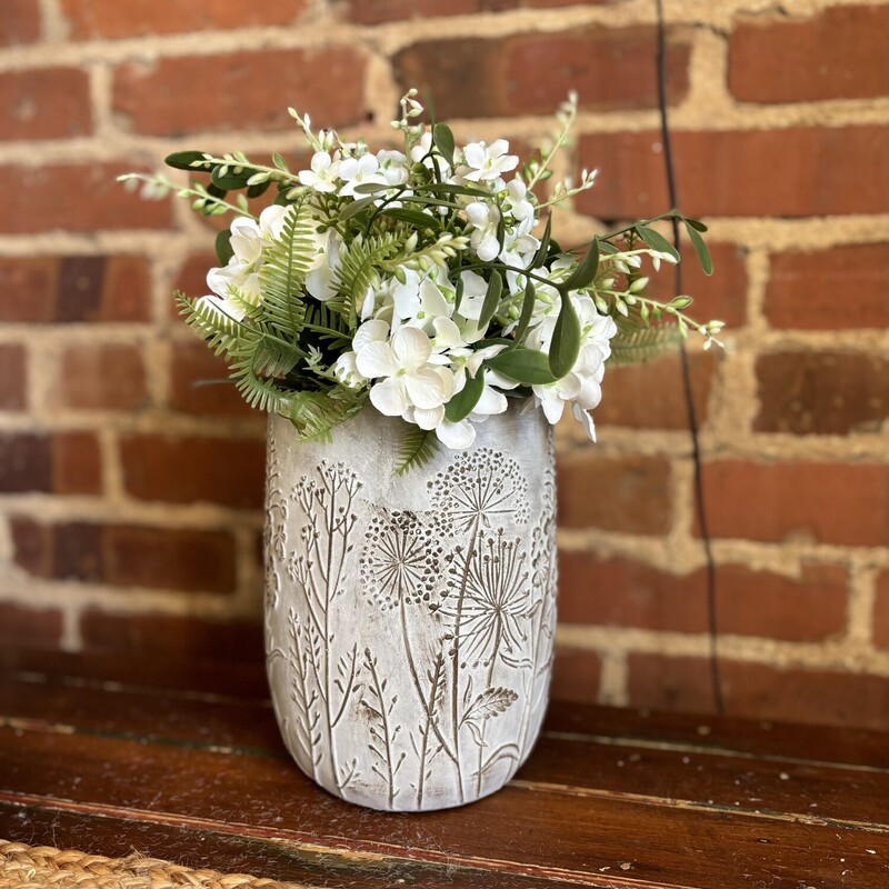 This pretty cement pot has raised lightly painted leaves, flowers and dandelions
This pot is perfect  for any color floral for a touch of spring to your home
Pot measures 8 inches tall, 6 inches width and 7 and a half inches deep