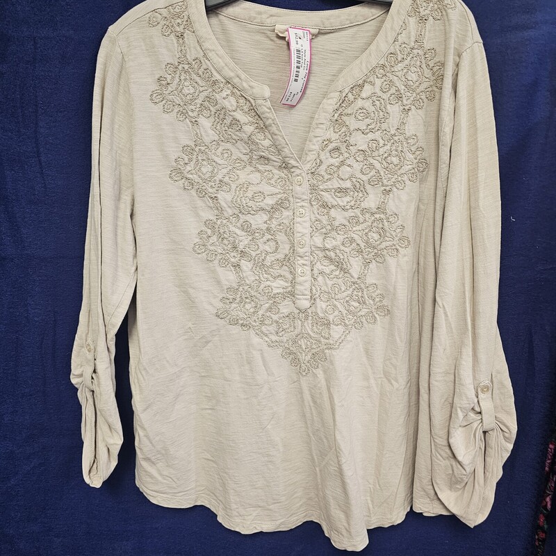 Cute long to half sleeve knit top in a soft tan with embroidered chest panel