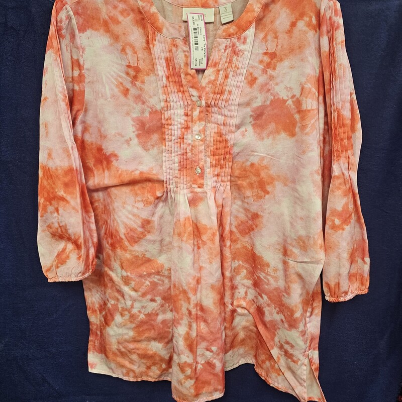 Half sleeve blouse in orange and pink tie dye print.