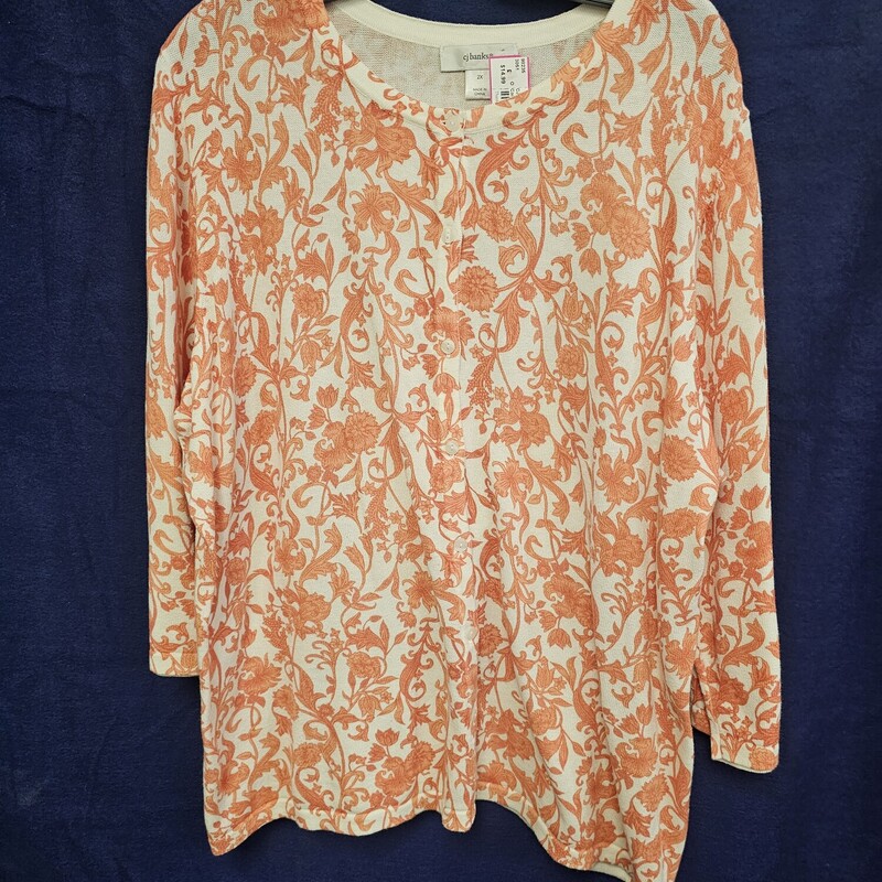 Half sleeve white cardigan with fun orange print. Has half sleeves and a button front
