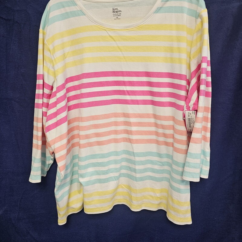 Half sleeve knit top in white with multi colored stripes!