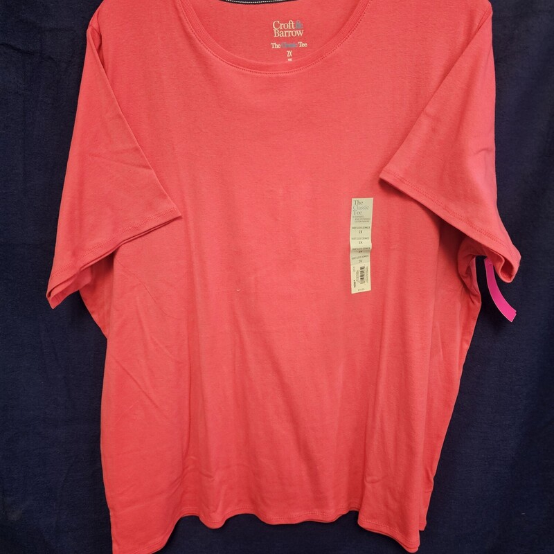 Brand new with tags, retails for $15 this tee is short sleeve and done in pink.