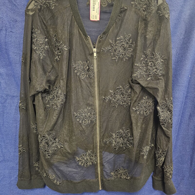 Zip up front jacket topper that is done completely in black lace. Sooooo cute!