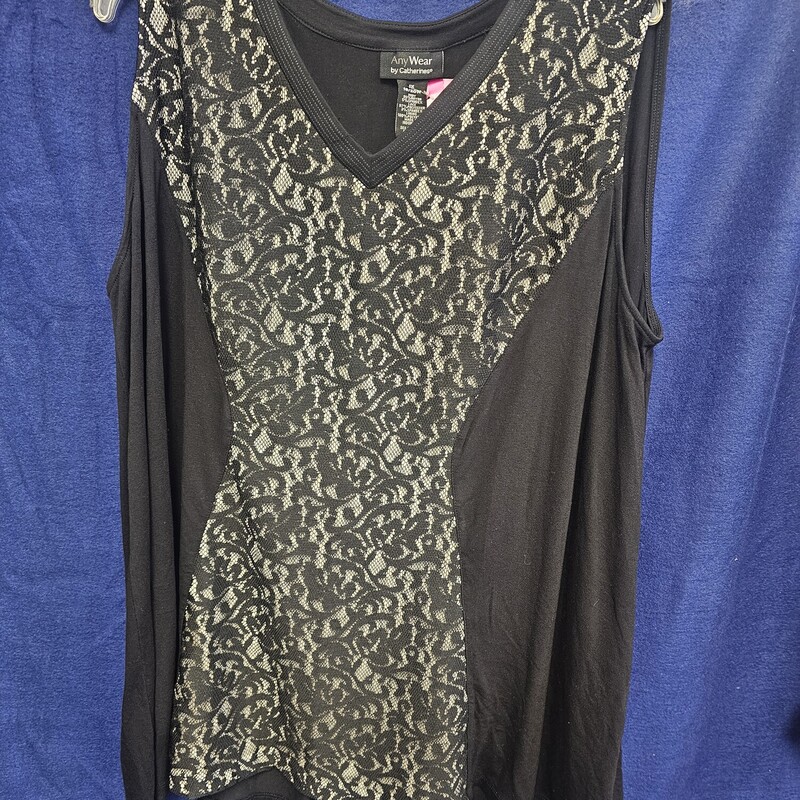 Love this wide shouldered tank in black and white with lace panel on the front.