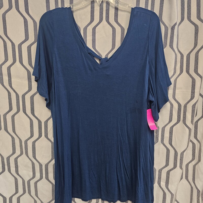 Short sleeve knit top with tie back in the prettiest of teal blues!