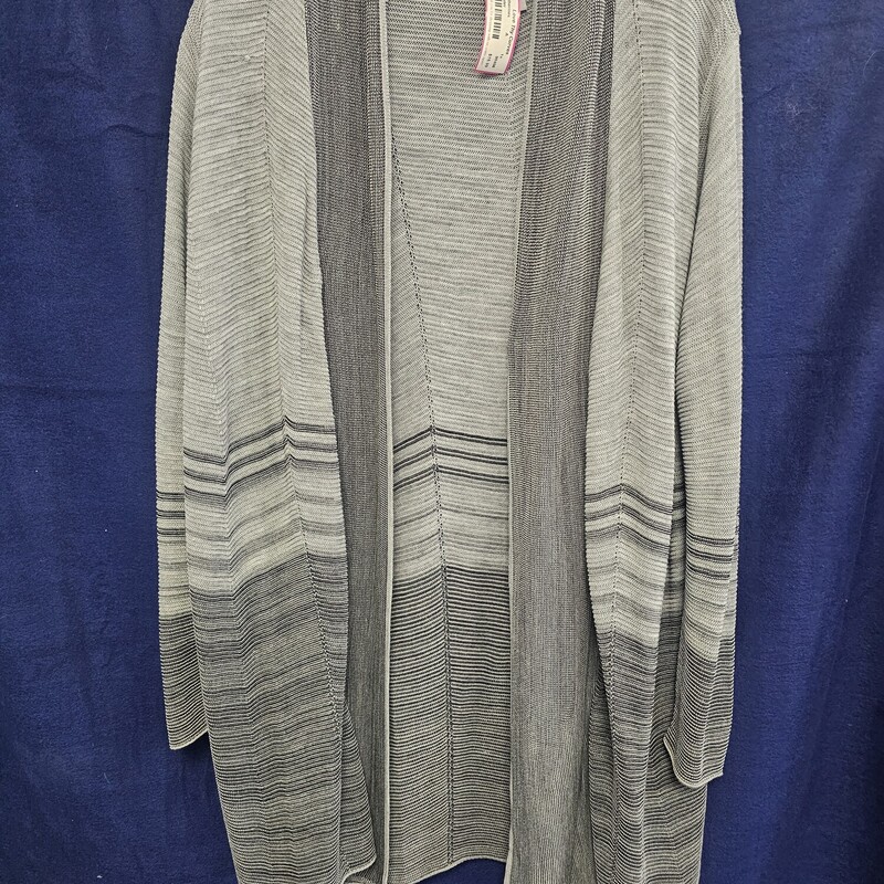 Love this duster that hits just below the hips. It is done in long sleeve with super light weight  no close front in greys
