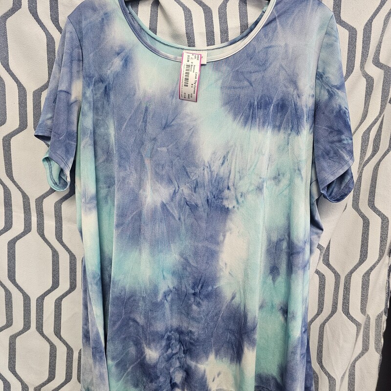 Short sleeve poly blend blouse in a fun blue and green tie dye print