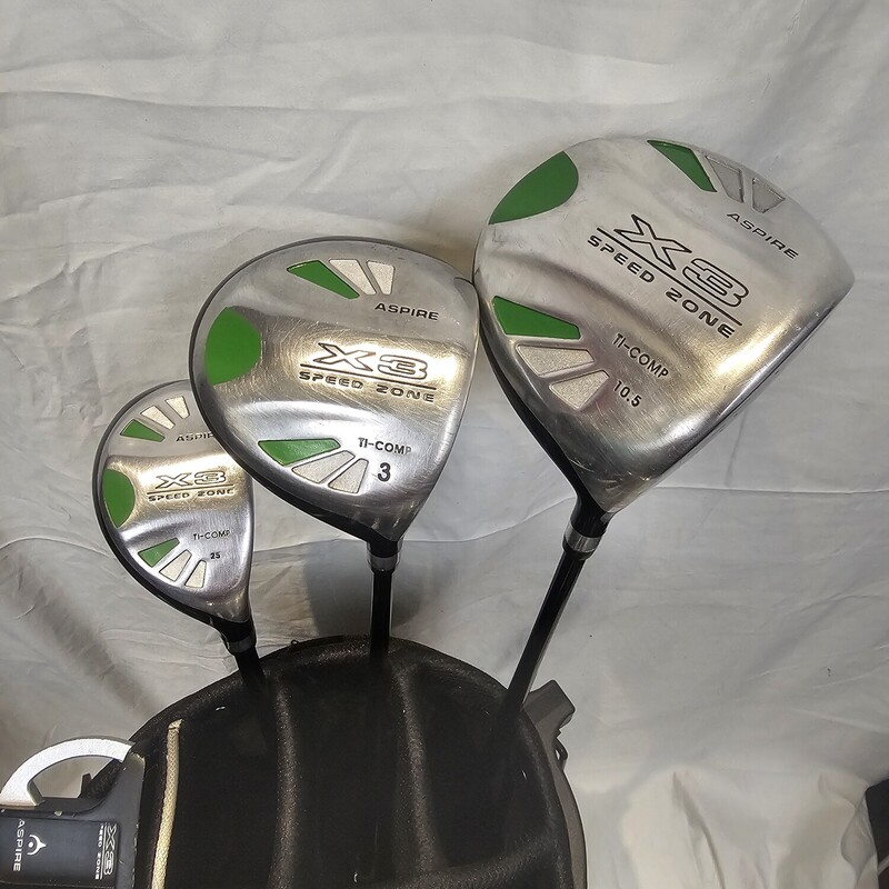 Aspire X3 Speed Zone 9 Piece Golf Set,
Size: Junior/Ladies Right Hand
Set Includes:
- Super Titanium Power 460cc Driver (w/ Head Cover)
- Fairway Wood (#3) (w/ Head Cover)
- Hybrid Wood (25 Degree) (w/ Head Cover)
- Stainless Steel Irons (6,7,8,9,PW)
- 3 Ball Putter
- Lightweight Stand Bag (Green)

Features:  Titanium alloy 460cc Driver with the latest high moment of inertia design - shots of the toe or heel still go straight!  Graphite medium firm flex shaft, headcover included. Stainless steel 15 degree 3 Wood. Graphite medium firm flex shaft, headcover included. Stainless steel 25 degree hybrid with the weight placed low and back for excellent forgiveness, launch angle and carry. Graphite medium firm flex shaft, headcover included. Stainless steel, perimeter weighted, undercut 6, 7, 8, 9 and PW Irons - all the very latest in technology to make shots jump off the face right at the target, no matter what part of the clubface contacts the ball. True temper regular flex steel shafts. High technology Putter with a soft face - results in better alignment, speed control and lower scores. Super high quality, light weight stand bag - perfect for transporting clubs a full 18, with two full length dividers, 8 way top, 6 full zippered pockets, insulated cooler pocket and snap-on rain/travel hood.

Gently Used: Excellent Like New Condition