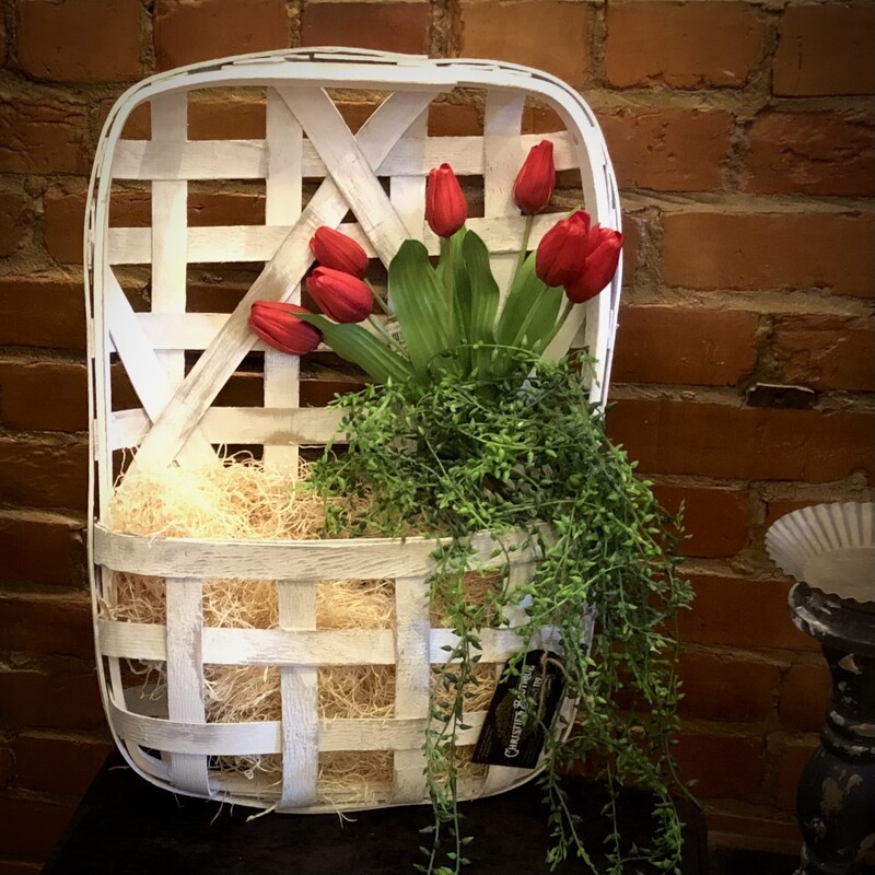 Sm Wh Wall Basket
21 H x 14 W x 6 D

Picture this: a charming slice of rustic paradise, nestled on your wall like a cozy corner of a country farmhouse. This white wall basket embodies the simple elegance of rural living, with its clean lines and timeless appeal. Crafted from sturdy materials and boasting a weathered finish, it exudes the warmth and character of a well-loved heirloom passed down through generations.