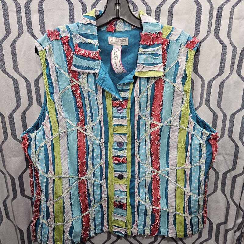 Cuteness over load with this super fun vest. Button up front.