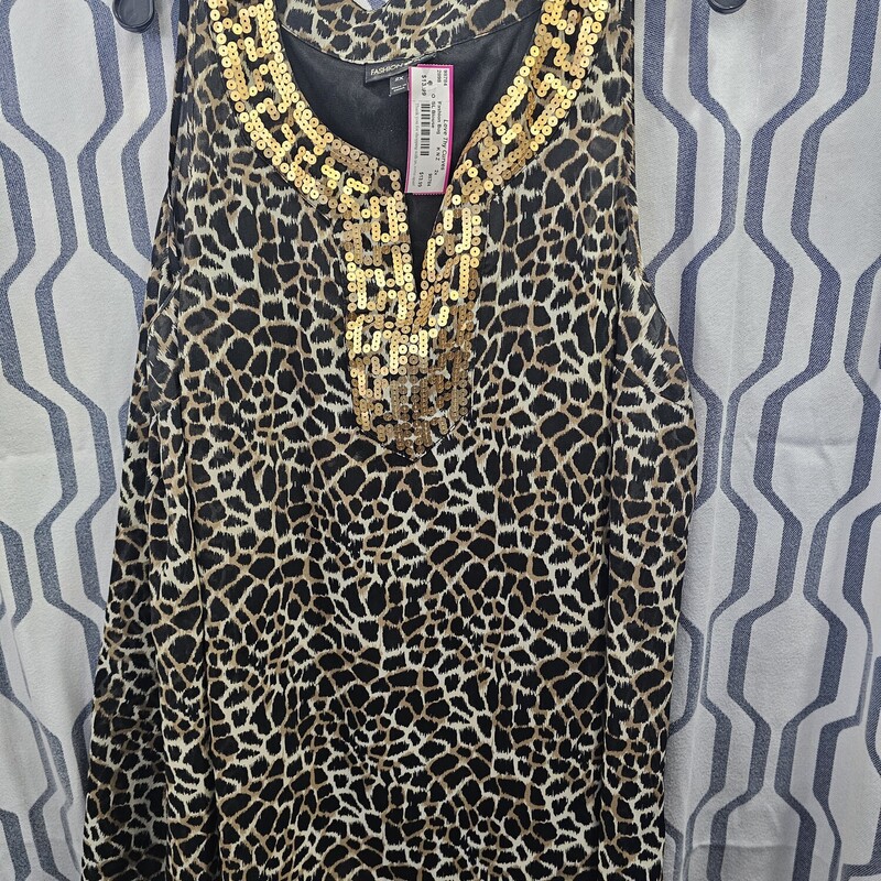 Flowey tank style blouse with sequins and brown and black animal print. Double layered with a black tank underneath