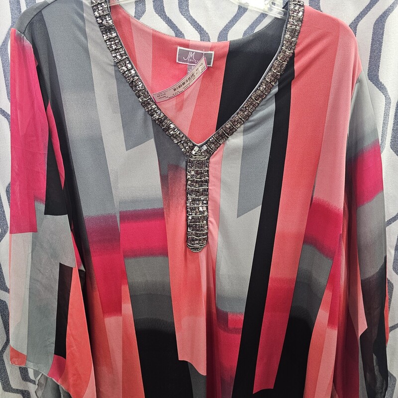 Half sleeve blouse in pinks, grey and black with beading along the neckline.