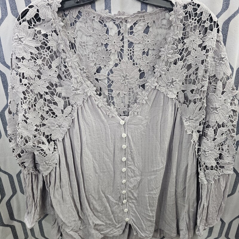 Boho style blouse in a super light lavender with floral lace design. Sooo pretty.