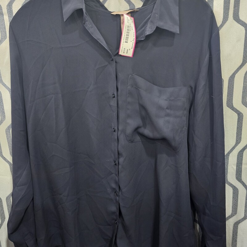 Button up blouse in a navy blue with long sleeves.
