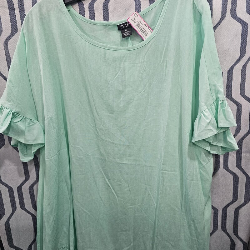 Brand new with tags, this super cute mint green blouse has short sleeves and ruffles.